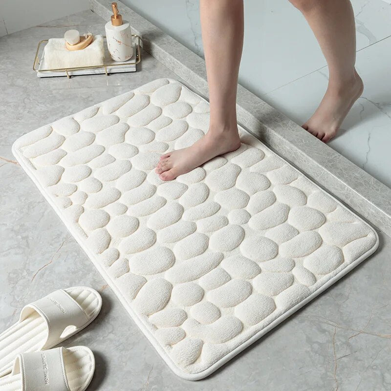 Tapis de douche rembouré et absorbant