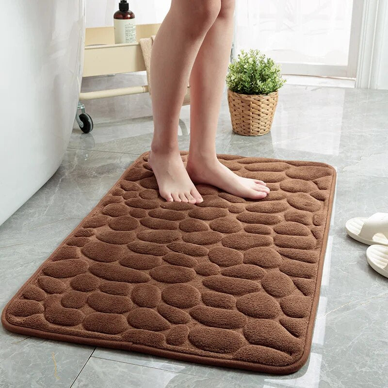 Tapis de douche rembouré et absorbant