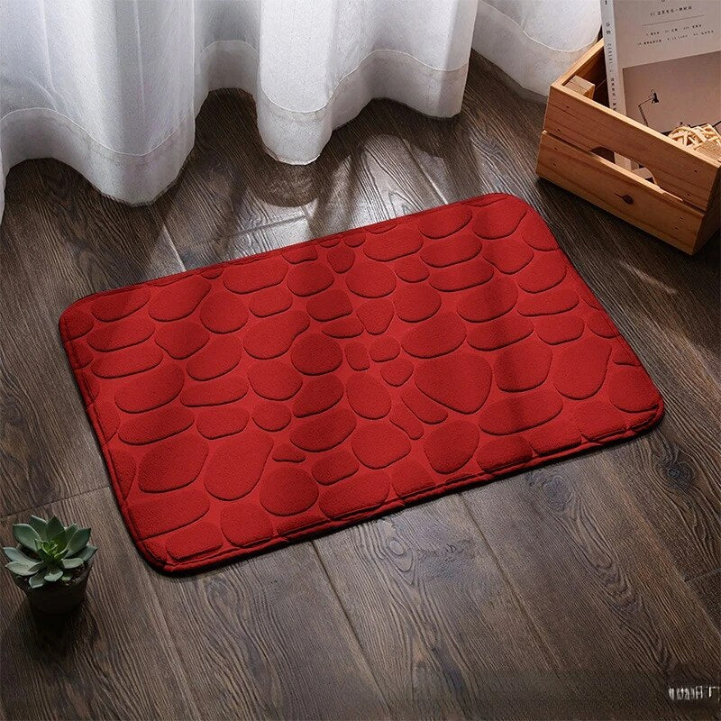 Tapis de douche rembouré et absorbant